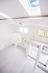 Image showing Interior of empty stylish modern open space two level apartment