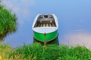 Image showing Metal rowboat on the lake 