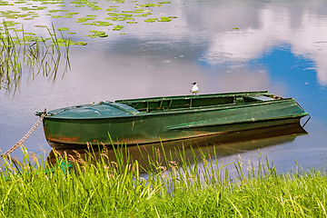 Image showing Metal rowboat on the lake 