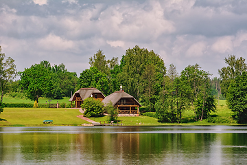 Image showing Houses on the bank of the river