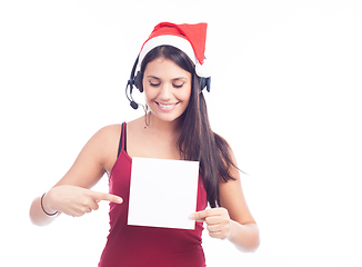 Image showing Christmas phone operator woman showing blank signboard