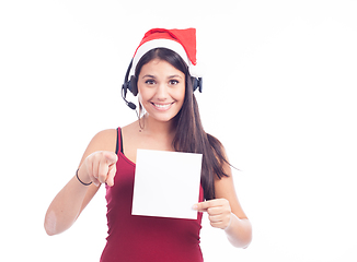 Image showing Christmas phone operator woman showing blank signboard