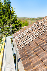 Image showing renovation of a brick tiled roof