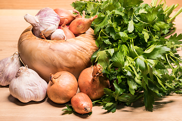 Image showing garlic onion shallot parsley with pestle and olive wood mortar