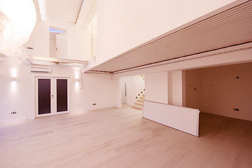 Image showing Interior of empty stylish modern open space two level apartment