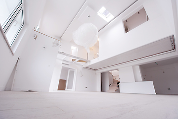 Image showing Interior of empty stylish modern open space two level apartment