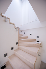 Image showing stylish interior with wooden stairs