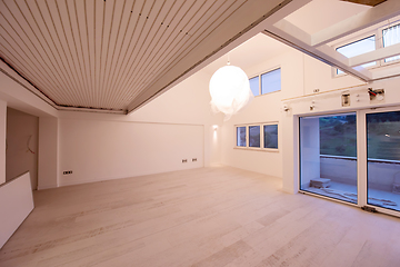 Image showing Interior of empty stylish modern open space two level apartment