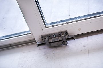 Image showing carpenters installing a balcony door