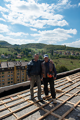 Image showing Construction worker installing a new roof