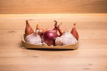 Image showing garlic onion shallots in a small wooden basket