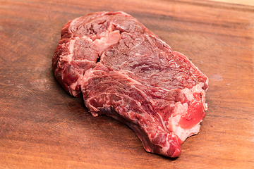 Image showing steak of beef on a wooden board