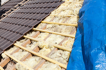 Image showing renovation of a brick tiled roof