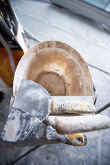 Image showing Top view of construction tools in bucket