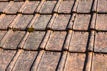 Image showing renovation of a brick tiled roof