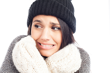 Image showing pretty brunette woman with a woolen hat a sweater and gloves tha