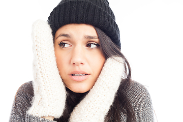 Image showing pretty brunette woman with a woolen hat a sweater and gloves tha