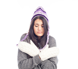 Image showing pretty brunette woman with a woolen Peruvian hat a sweater and g