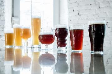 Image showing Glasses of different kinds of beer, time for oktoberfest