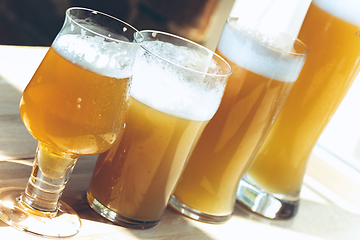 Image showing Glasses of different kinds of beer, time for oktoberfest