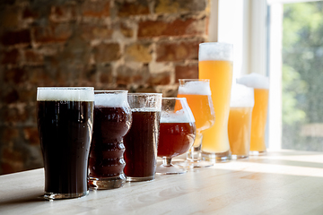 Image showing Glasses of different kinds of beer, time for oktoberfest