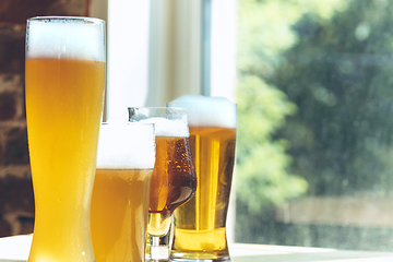 Image showing Glasses of different kinds of beer, time for oktoberfest