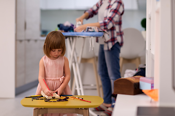 Image showing mother and daughter spending time together at home