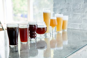 Image showing Glasses of different kinds of beer, time for oktoberfest