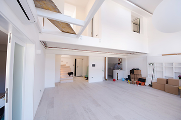 Image showing Interior of empty stylish modern open space two level apartment