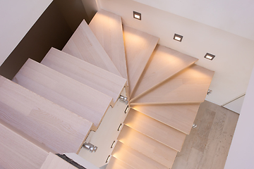 Image showing stylish interior with wooden stairs