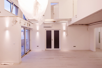 Image showing Interior of empty stylish modern open space two level apartment