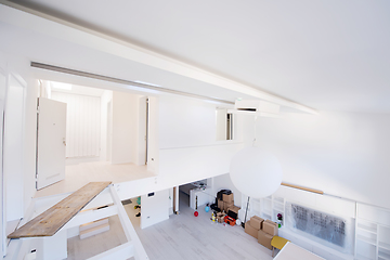 Image showing Interior of empty stylish modern open space two level apartment