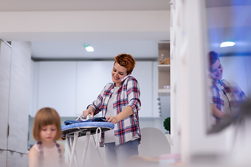 Image showing mother and daughter spending time together at home