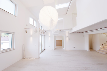 Image showing Interior of empty stylish modern open space two level apartment