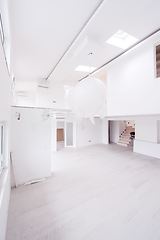 Image showing Interior of empty stylish modern open space two level apartment