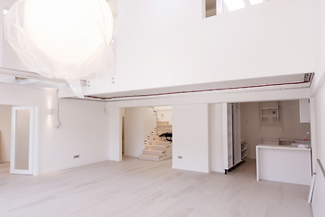 Image showing Interior of empty stylish modern open space two level apartment