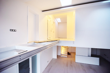 Image showing Interior of empty stylish modern open space two level apartment