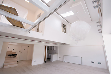 Image showing Interior of empty stylish modern open space two level apartment