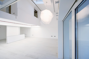 Image showing Interior of empty stylish modern open space two level apartment