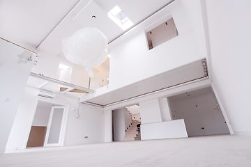 Image showing Interior of empty stylish modern open space two level apartment