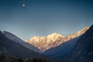 Image showing Langtang valley moonrise over mountain