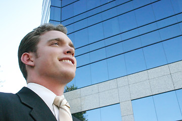 Image showing businessman and business building