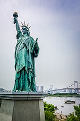 Image showing Statue of liberty and tokyo cityscape, Japan