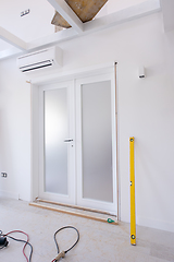 Image showing double glass door with white wooden frame