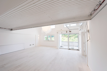 Image showing Interior of empty stylish modern open space two level apartment