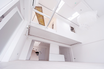 Image showing Interior of empty stylish modern open space two level apartment