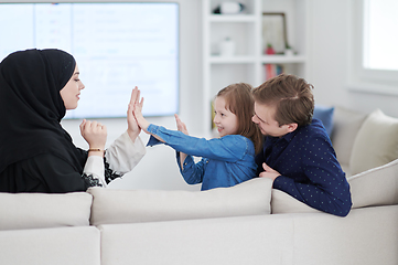 Image showing Happy Muslim family having fun at home