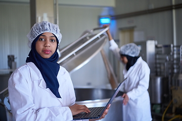 Image showing business woman team in local cheese production company