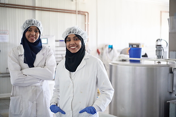 Image showing business woman team in local cheese production company