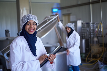 Image showing business woman team in local cheese production company